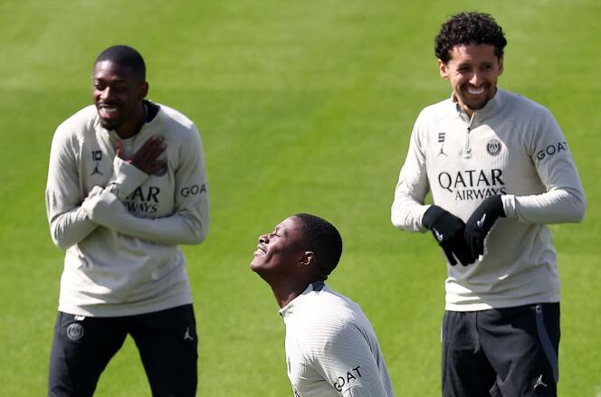 Parisians Ousmane Dembélé, Nuno Mendes and Marquinhos (left to right), during a training session in Poissy (Yvelines), 6 May 2024.